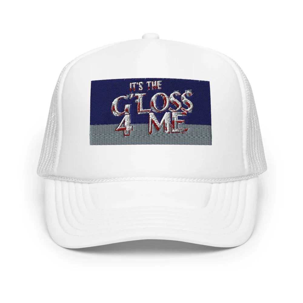 White trucker hat with 'IT'S THE GLOSS 4 ME' embroidered on front, blue and gray background.