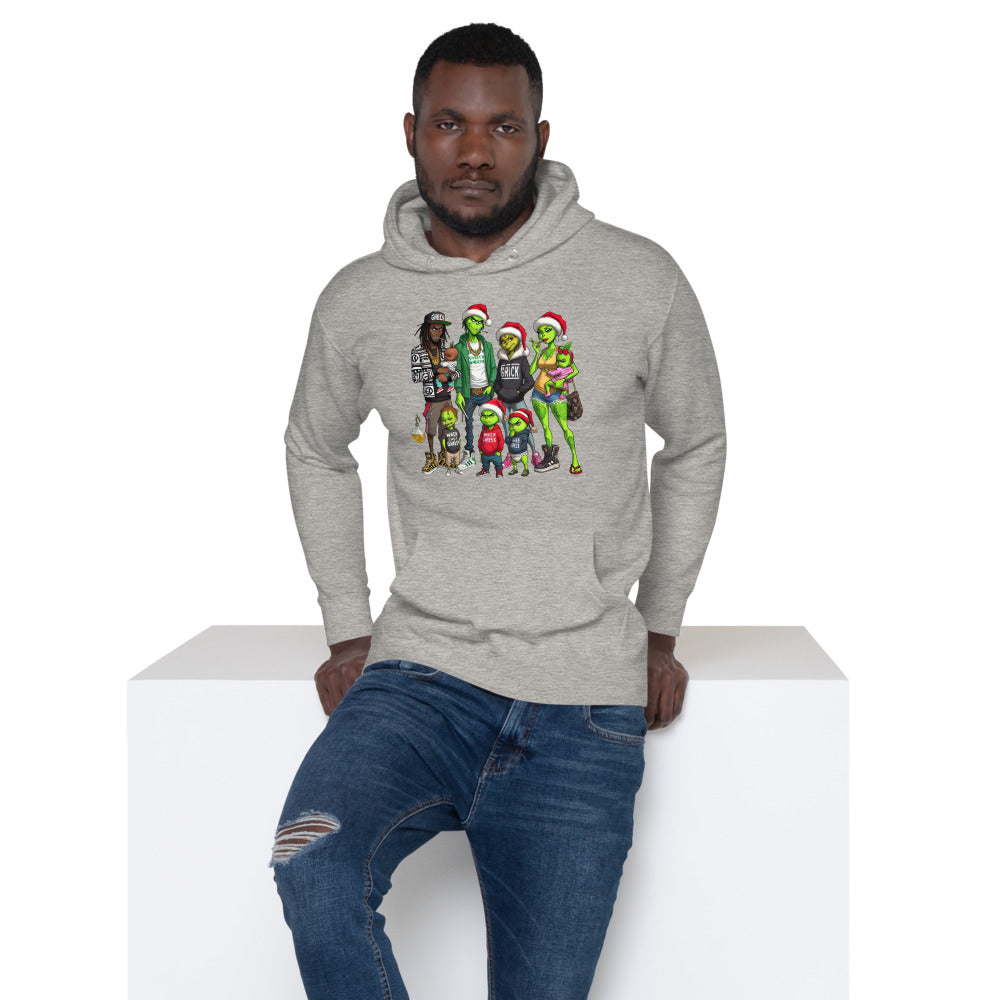 Man wearing grey hoodie with cartoon Grinch family Christmas design, casual holiday fashion